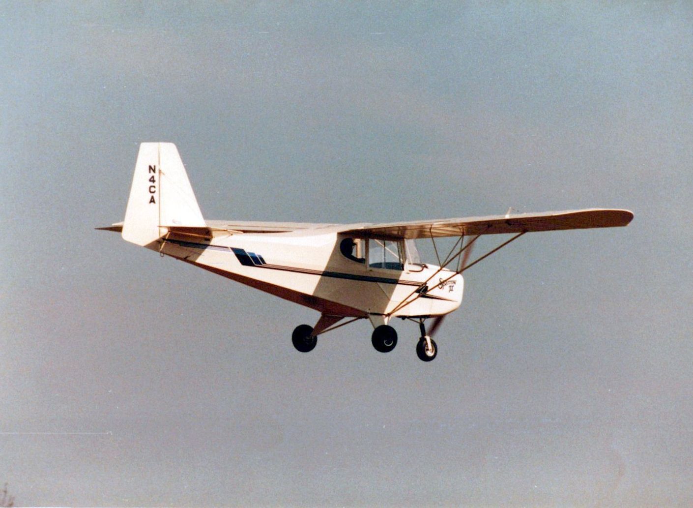 White Carlson Sparrow II in flight