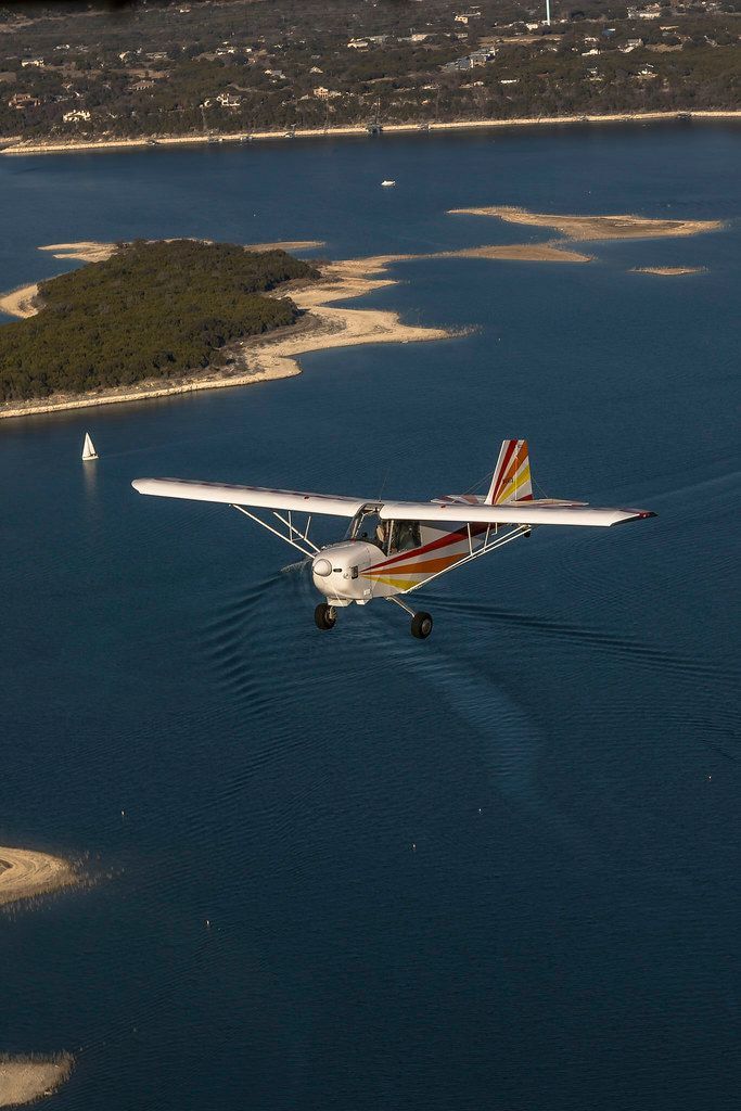 Carlson Sparrow Sport Special flying above a lake, seen from above