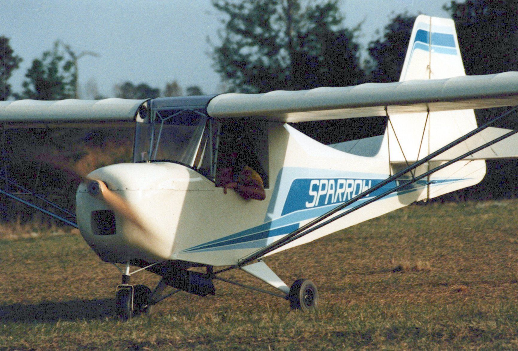 Front three-quarter view of a Carlson Sparrow Ultralight on grass